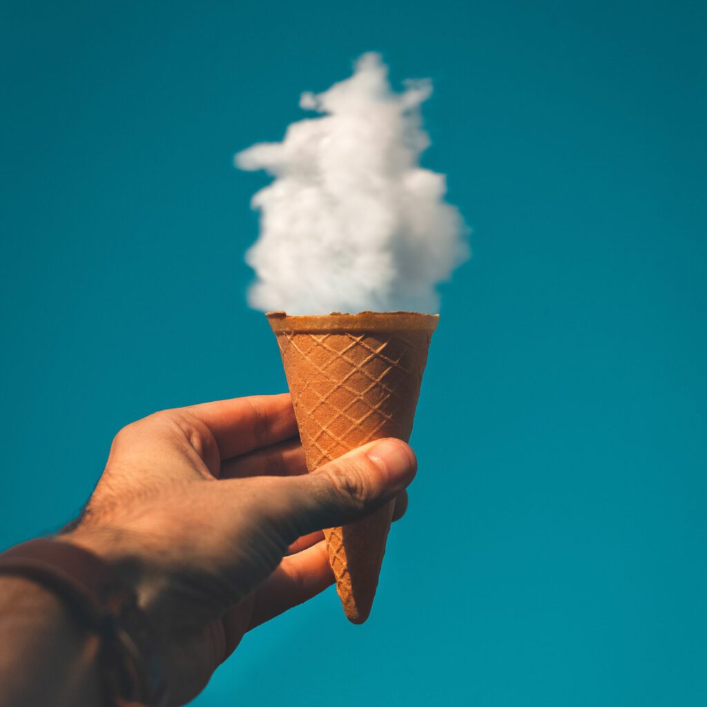 Ice creme cone with clouds
